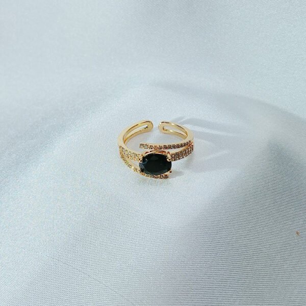 gold color black ring - luxore - rings - lifestyle - 1